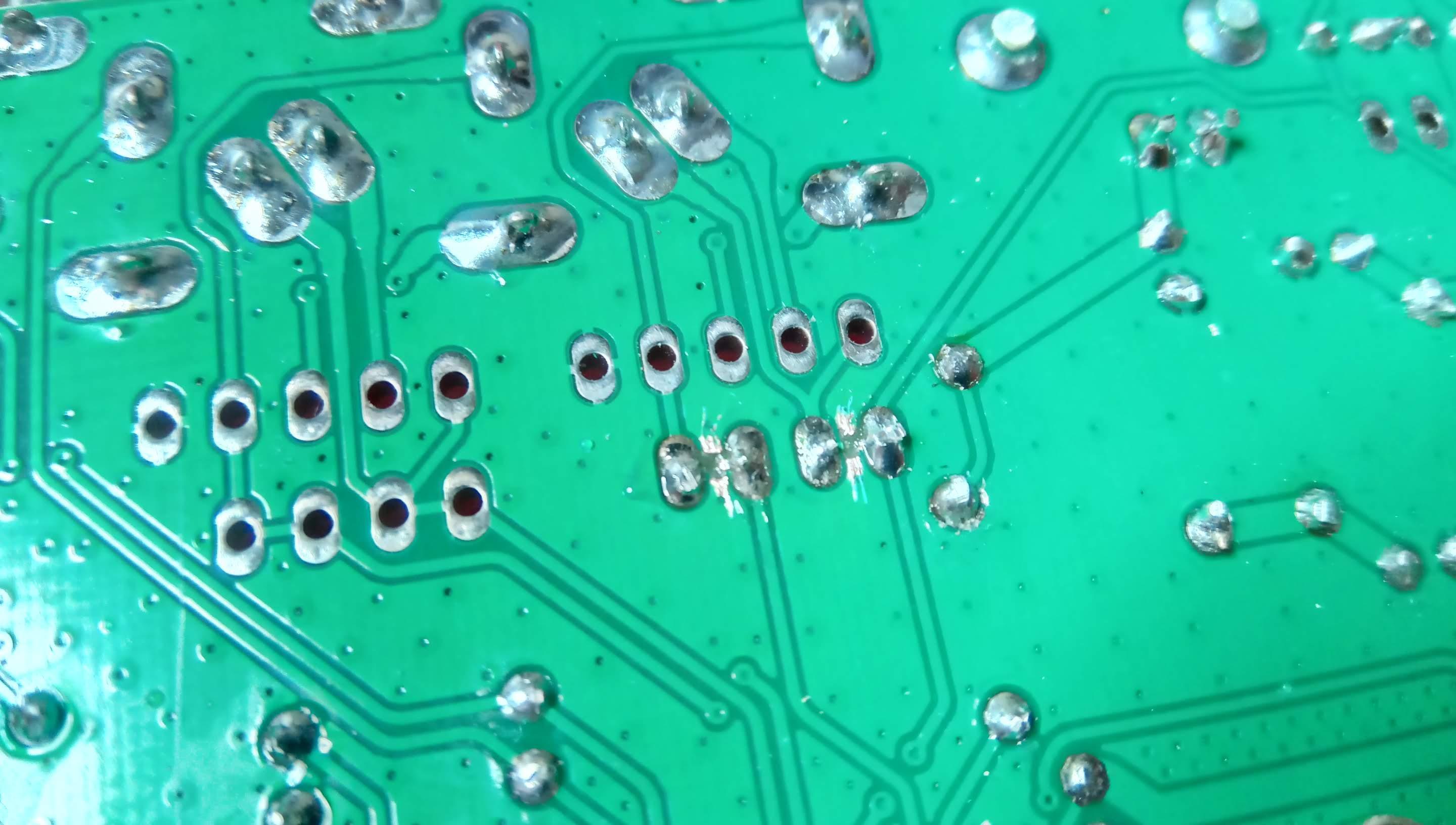 Two cuts and two jumpers to swap PTT and +5V output