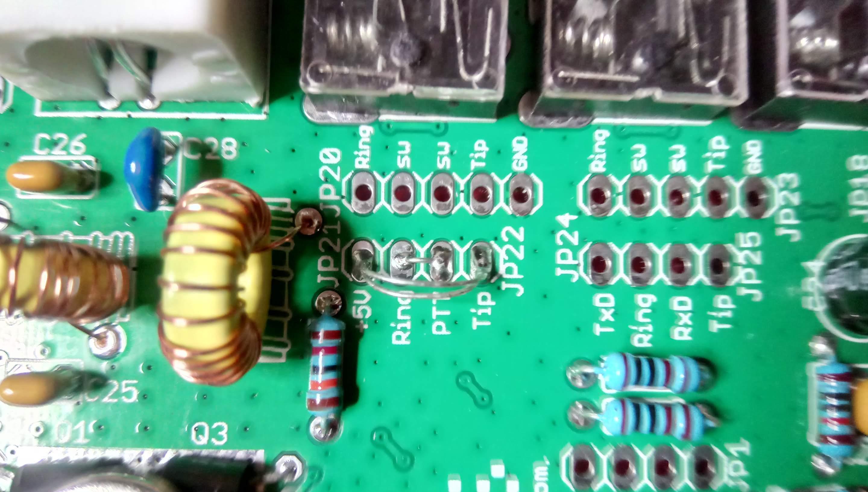 Two cuts and two jumpers to swap PTT and +5V output