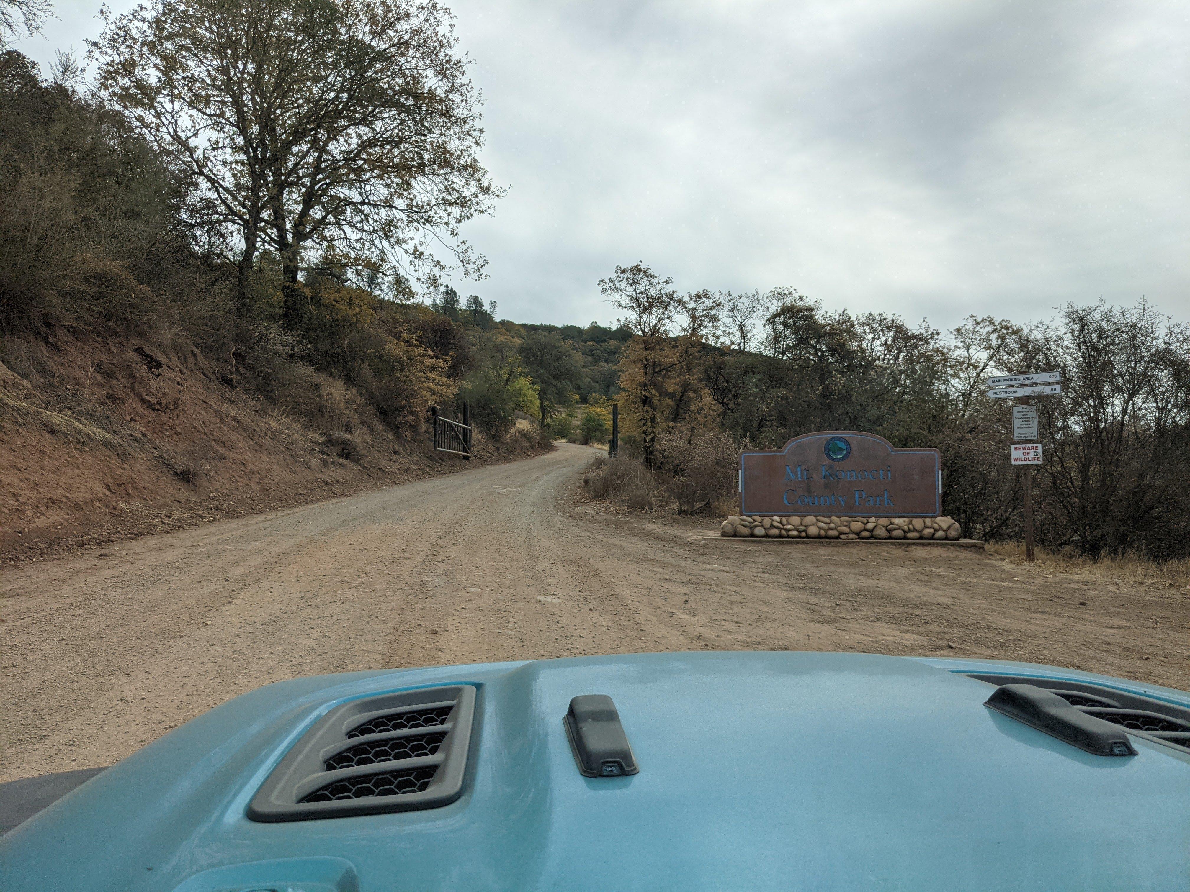 Park entrance gate, note - road is unpaved