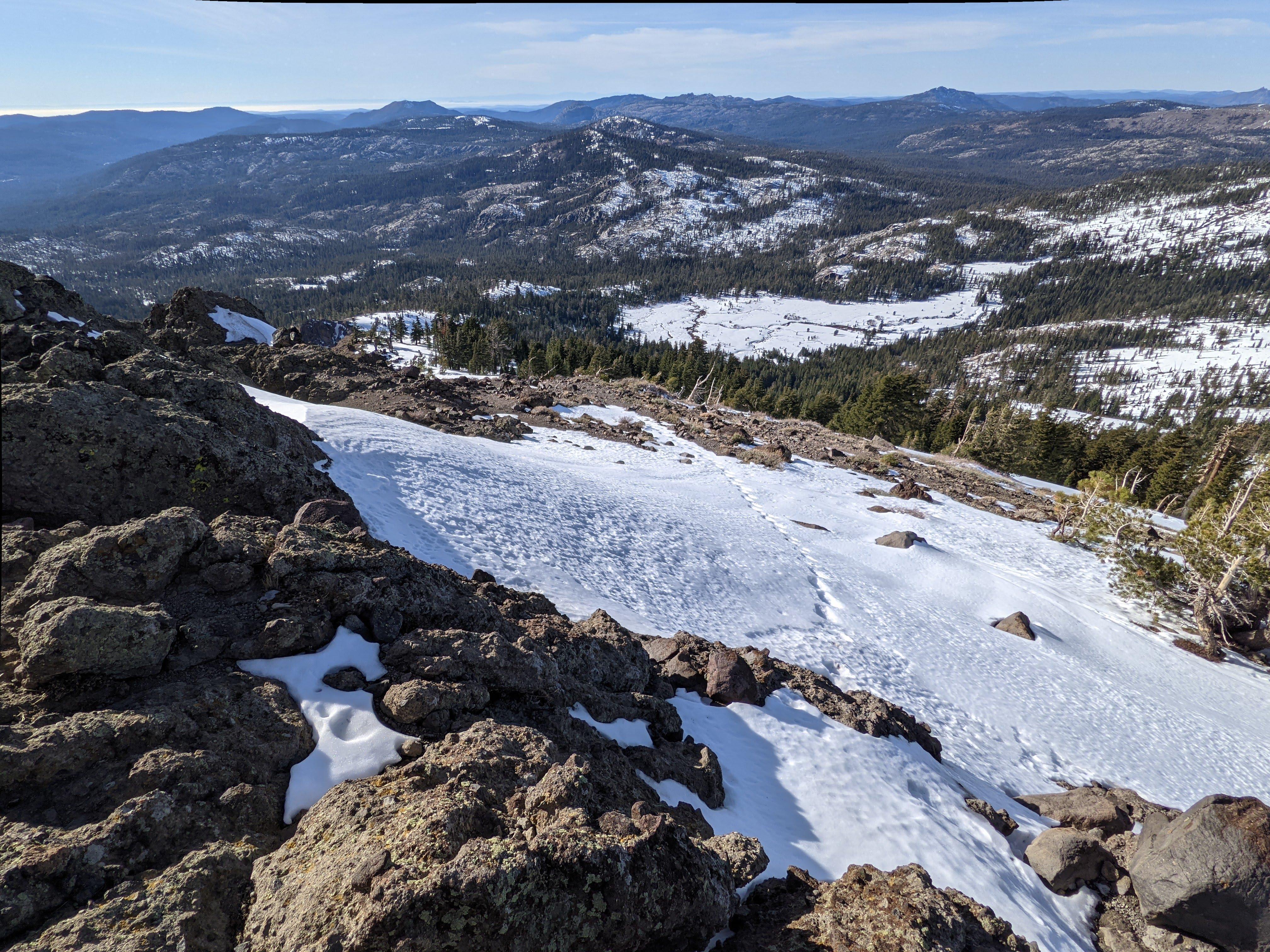 Quite a bit of a drop right below the summit. Careful - might be icy and slippery!