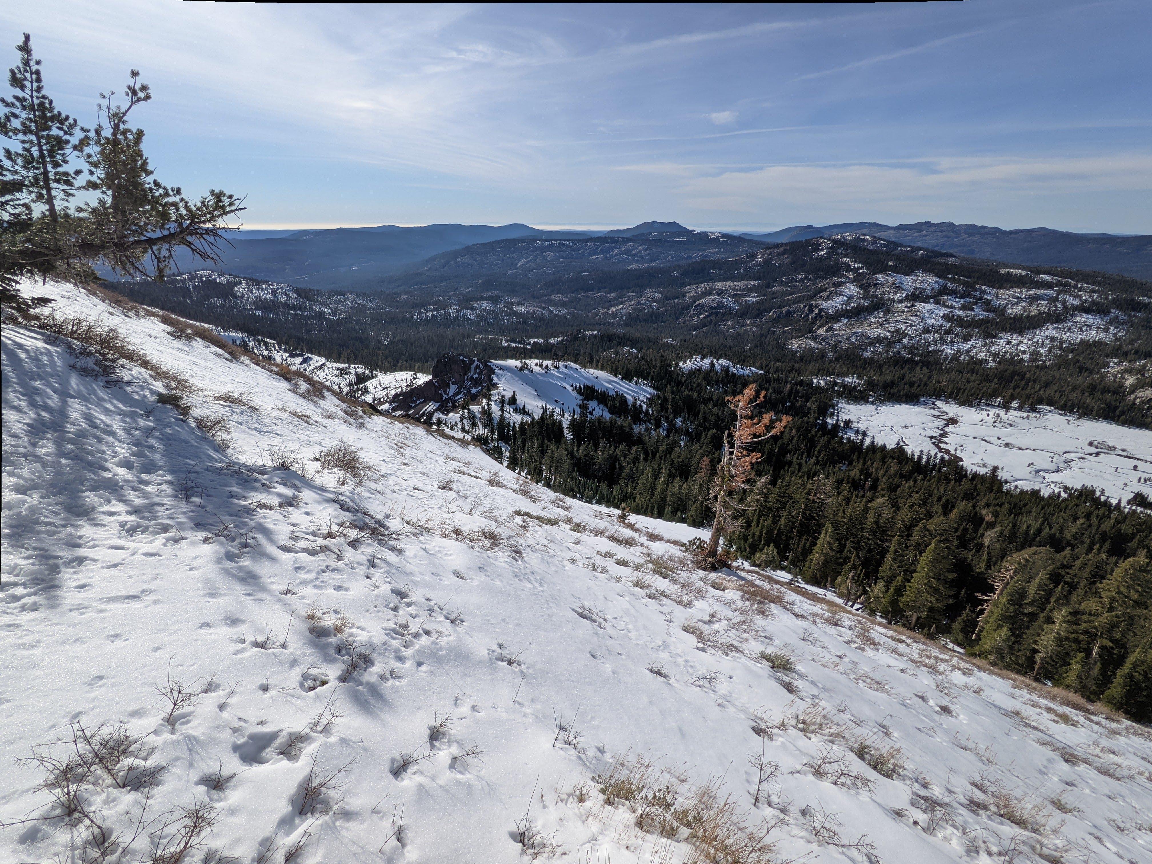 Better follow the ridge - the slope might thaw and refreeze forming an icy crust